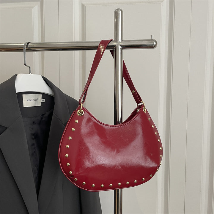 Damen elegante Schultertasche mit goldenen Nieten Nord Taschen