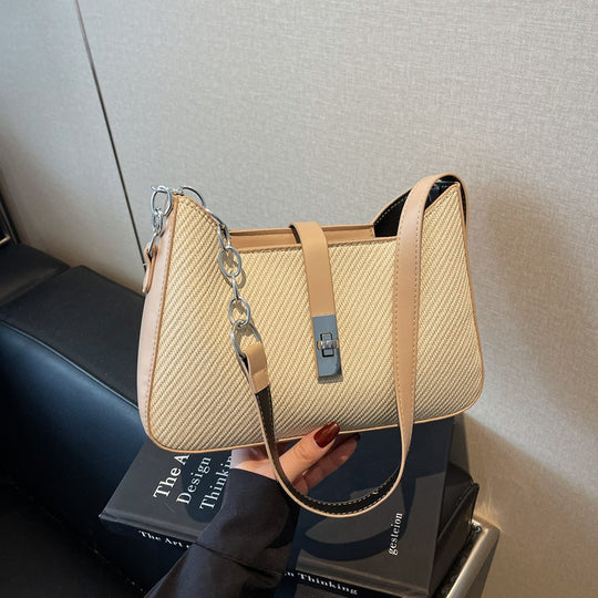 Damen stylische Umhängetasche mit geprägtem Design und dekorativer Kettenverzierung Nord Taschen