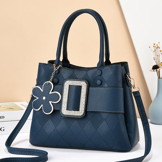Damen Designer Handtasche mit besonderen Verzierungen und praktischem Schultergurt Nord Taschen