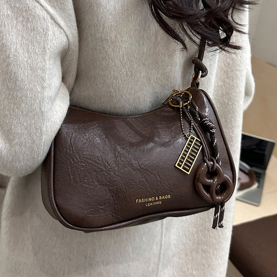 Damen Umhängetasche aus hochwertigem Kunstleder mit elegantem Knotenverschluss Nord Taschen