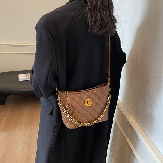 Damen Umhängetasche mit eleganter Steppung und luxuriösem Kettenakzent Nord Taschen