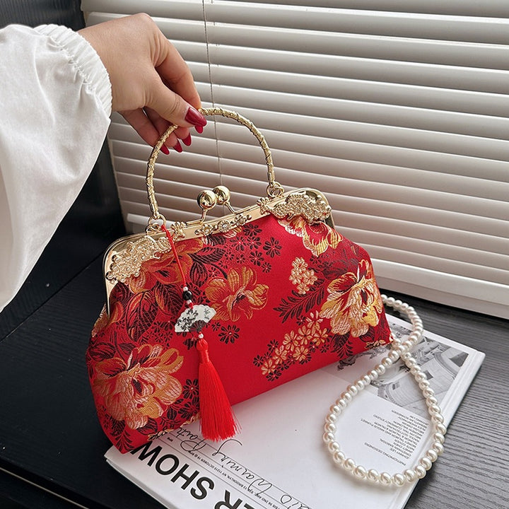Damen elegante Umhängetasche mit floralem Design und goldenen Akzenten Nord Taschen