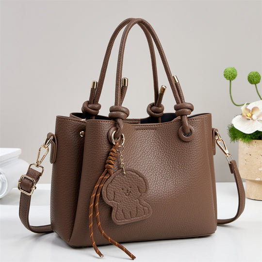 Damen Handtasche mit eleganten Details und abnehmbarer Quastenanhänger Nord Taschen