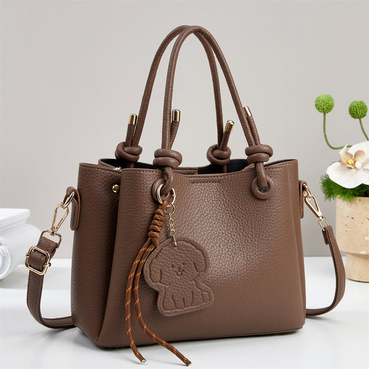 Damen Handtasche mit eleganten Details und abnehmbarer Quastenanhänger Nord Taschen