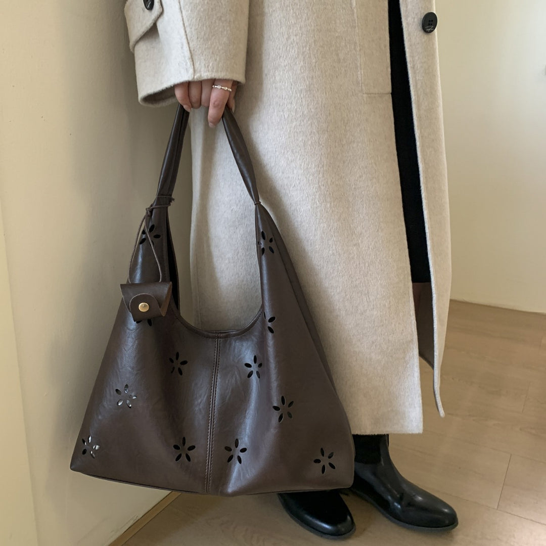 Damen Hobo-Tasche mit floralem Schnitt und praktischem Mini-Organizer Nord Taschen