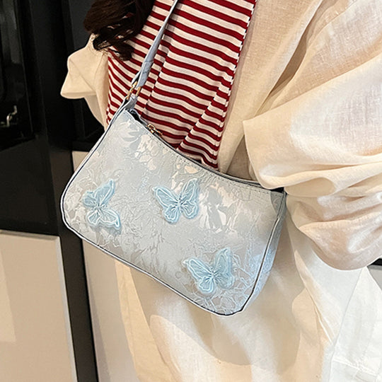 Damen Handtasche mit handgearbeitetem Blumenmuster und modischem Kettenriemen Nord Taschen