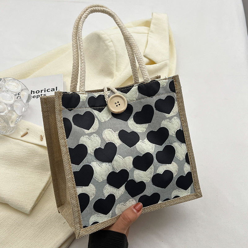 Damen Jute Tragetasche mit liebevollem Herzdesign und praktischem Knopfverschluss Nord Taschen