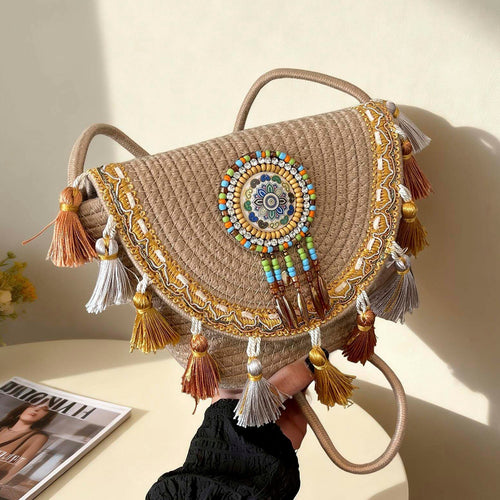 Damen Schultertasche mit kunstvollem Häkelmuster und dekorativen Quasten Nord Taschen