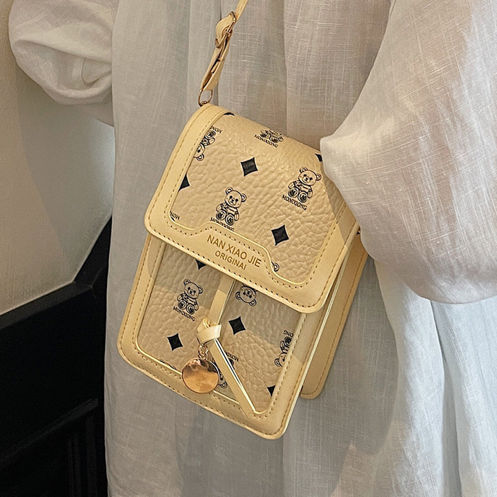 Damen Umhängetasche mit strukturiertem Design und dekorativen Details Nord Taschen