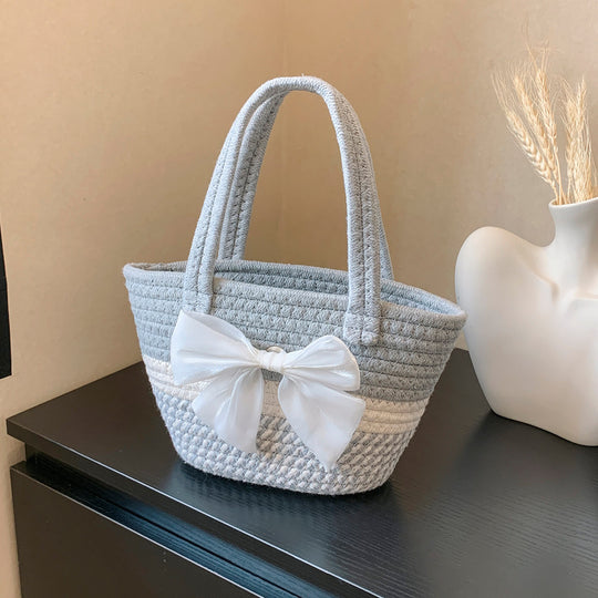 Damen Handtasche aus geflochtenem Naturmaterial mit floralem Detail Nord Taschen