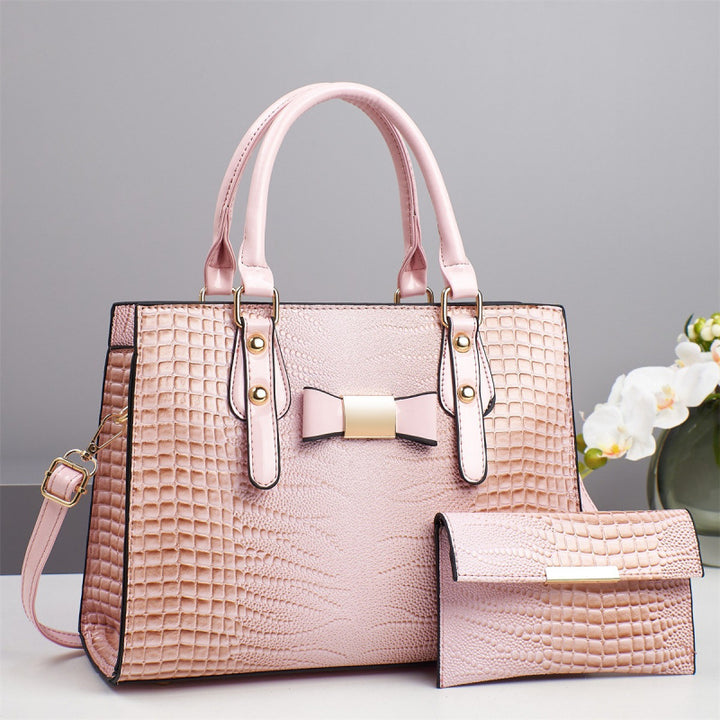 Damen elegante Handtasche mit schicker Schleifenapplikation und edlem Krokodil-Look Nord Taschen