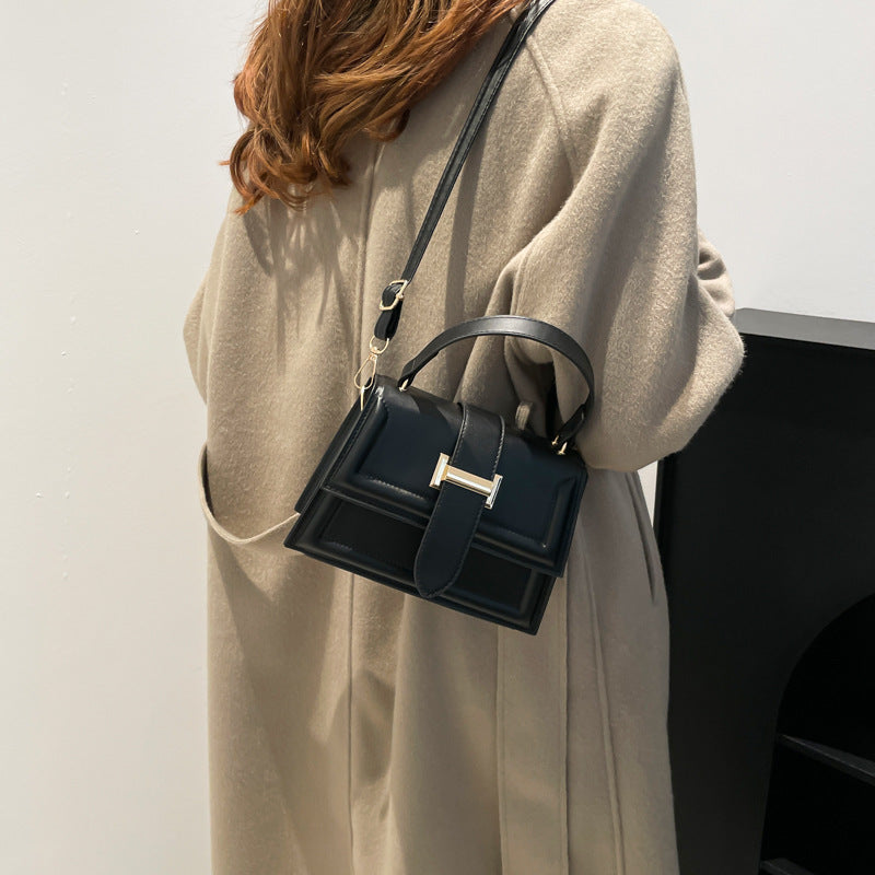Damen elegante Handtasche mit praktischem Klappverschluss Nord Taschen