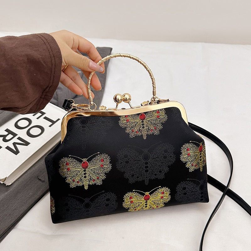 Damen modische Handtasche mit filigranem Schmetterlingsmuster und eleganten Akzenten Nord Taschen