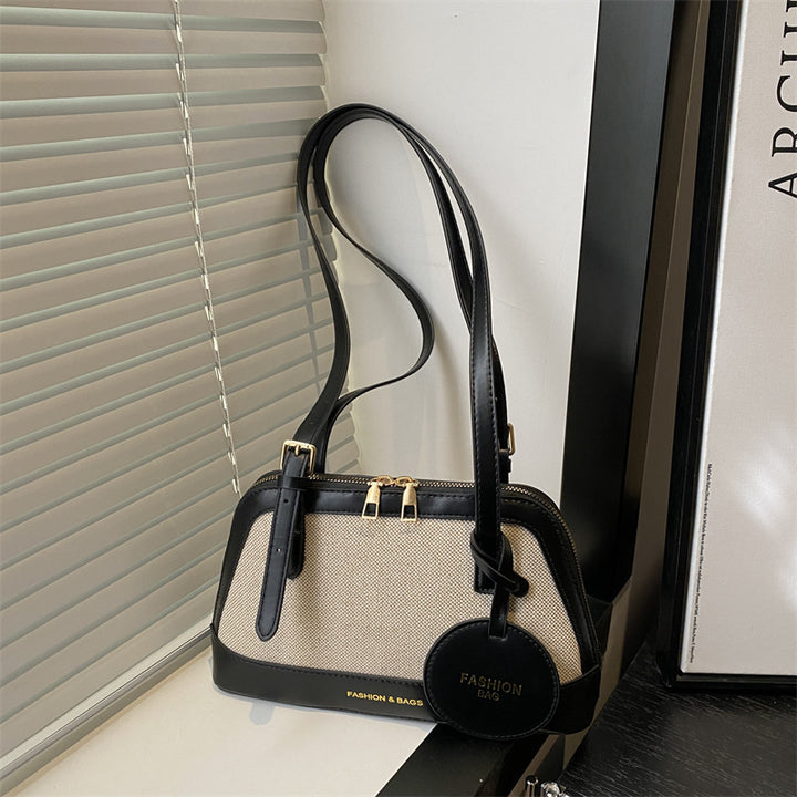 Damen Umhängetasche mit strukturiertem Gewebe und elegantem Detail Nord Taschen