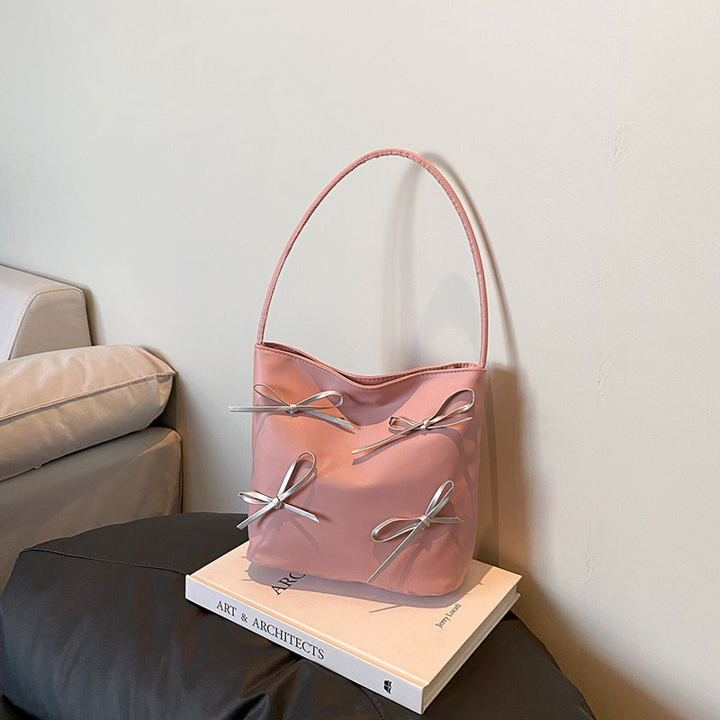 Damen Henkeltasche mit dekorativen Schleifendetails Nord Taschen