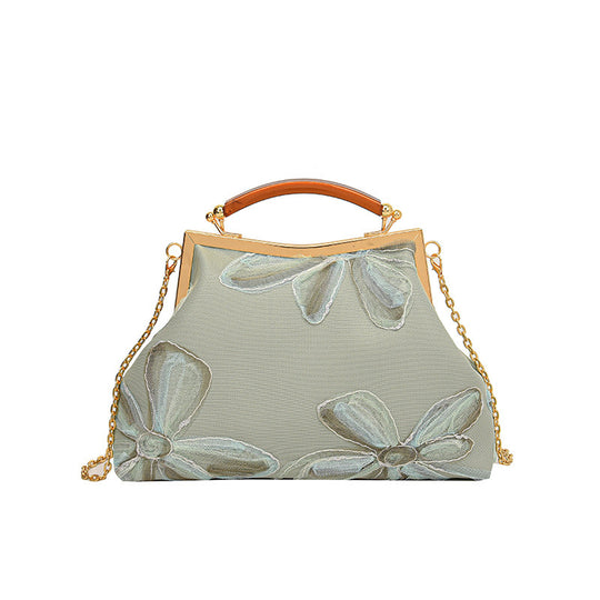 Damen Handtasche mit floralem Muster und elegantem Kettenakkzent Nord Taschen