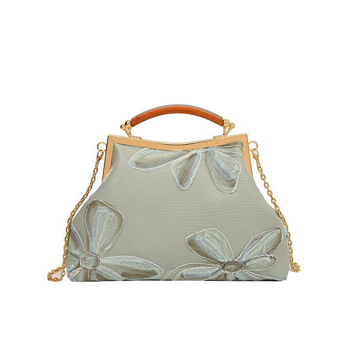 Damen Handtasche mit floralem Muster und elegantem Kettenakkzent Nord Taschen