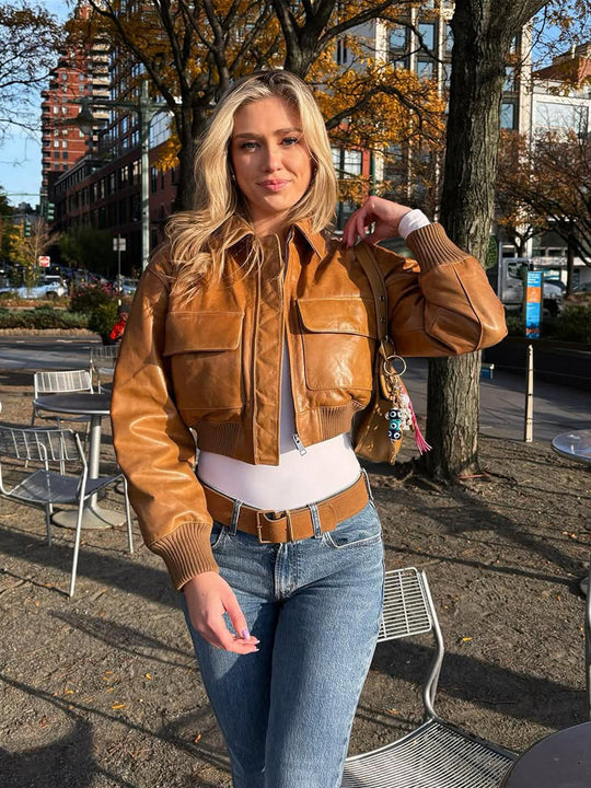 Damen Kurze Lederoptik-Blousonjacke mit großen Pattentaschen und geripptem Bund Nord Taschen
