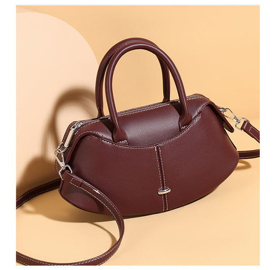 Damen Handtasche mit modernem, geschwungenem Design und abnehmbarem Schulterriemen Nord Taschen