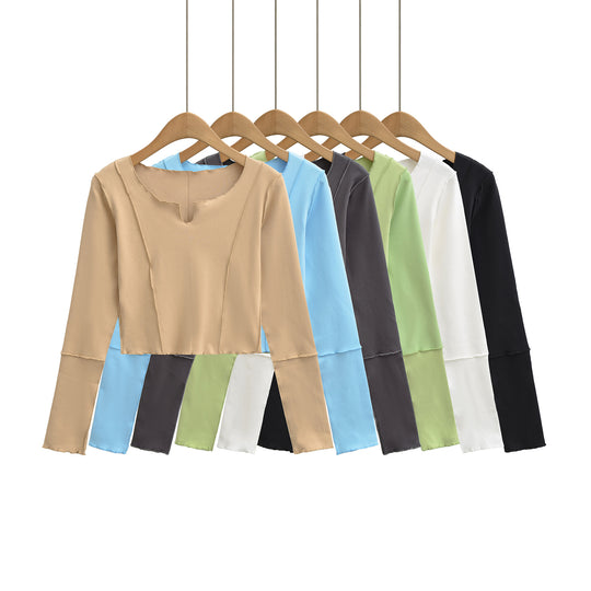 Damen Kurzes Langarmshirt mit sichtbaren Rollnähten und Notch-Ausschnitt Nord Taschen