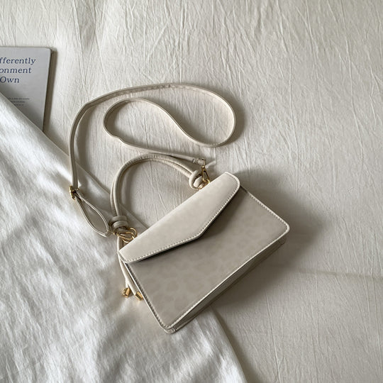 Damen Umhängetasche mit eleganter Leo-Prägung und abnehmbarem Schulterriemen Nord Taschen