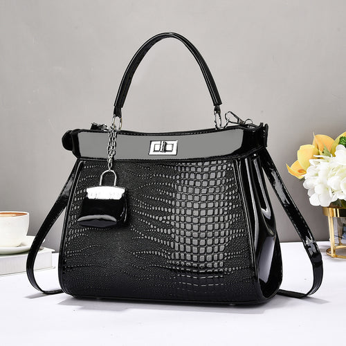 Damen Handtasche mit glänzender Krokodil-Prägung und abnehmbarer Mini-Clutch Nord Taschen