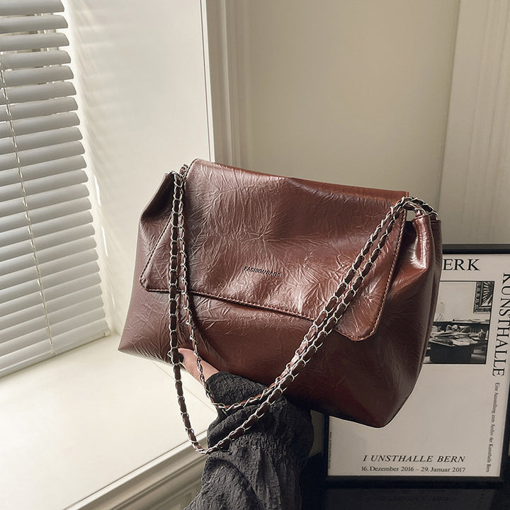 Damen modische Umhängetasche mit eleganter Kettenverzierung Nord Taschen