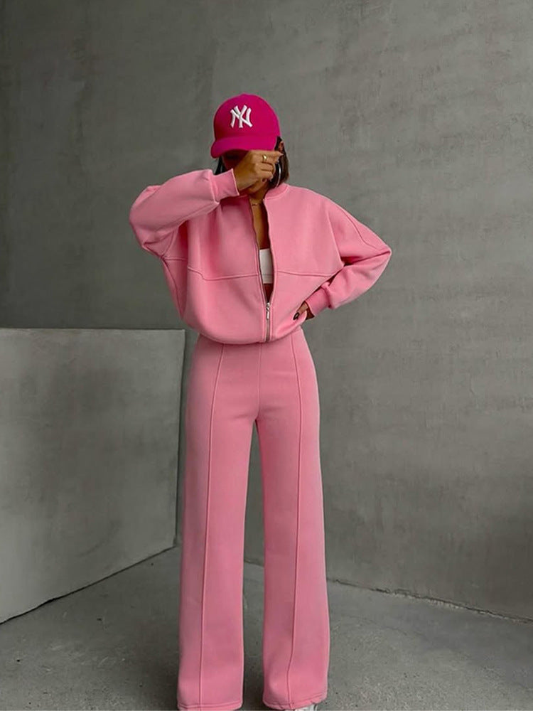 Damen sportive Oversize-Fleecejacke mit diagonaler Reißverschluss-Optik und weit geschnittener High-Waist-Jogginghose Nord Taschen