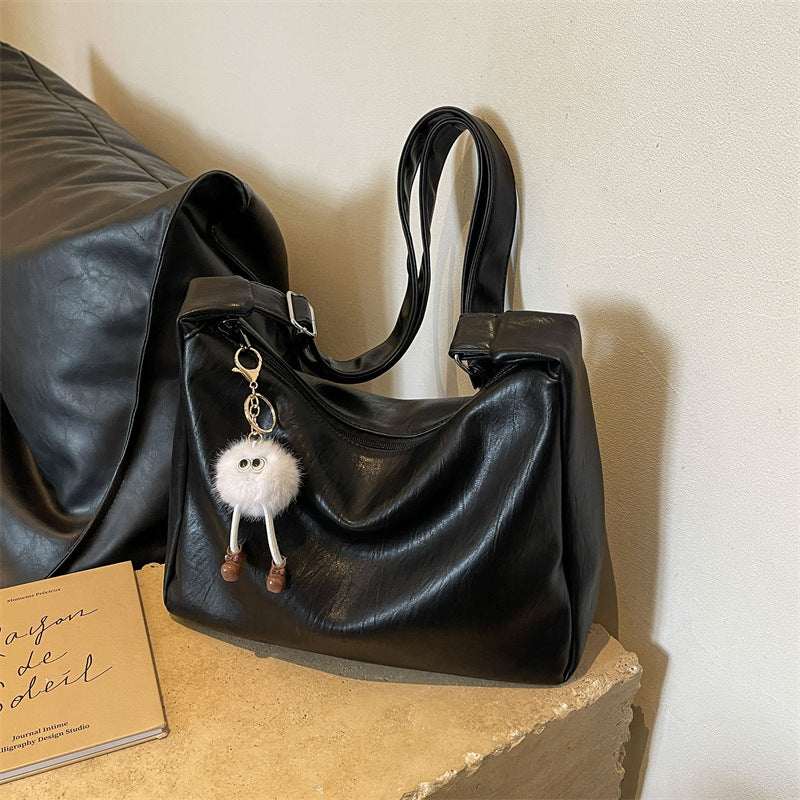 Damen Handtasche mit verspieltem Schlüsselanhänger Nord Taschen