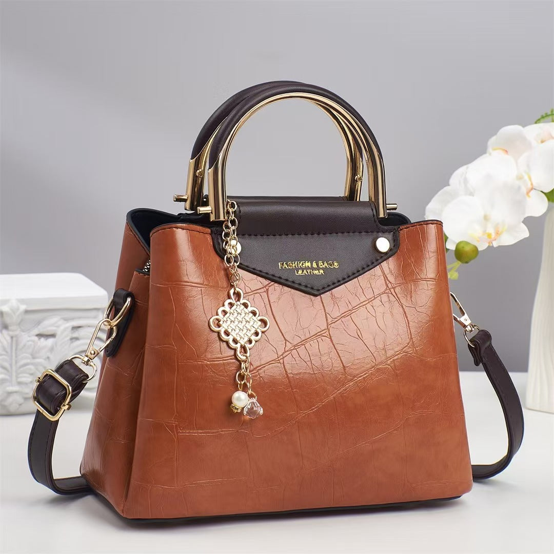 Damen elegante Handtasche mit goldenen Akzenten Nord Taschen