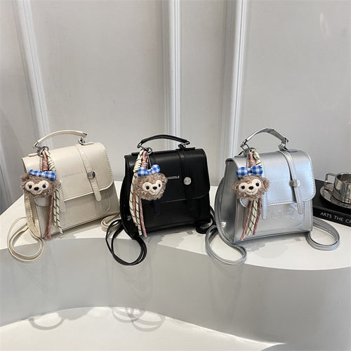 Damen modische Mini-Rucksacktasche mit verspieltem Anhänger Nord Taschen