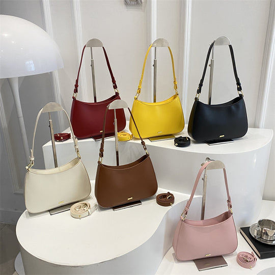 Damen elegante Umhängetasche mit geschwungenem Design und abnehmbarem Riemen Nord Taschen