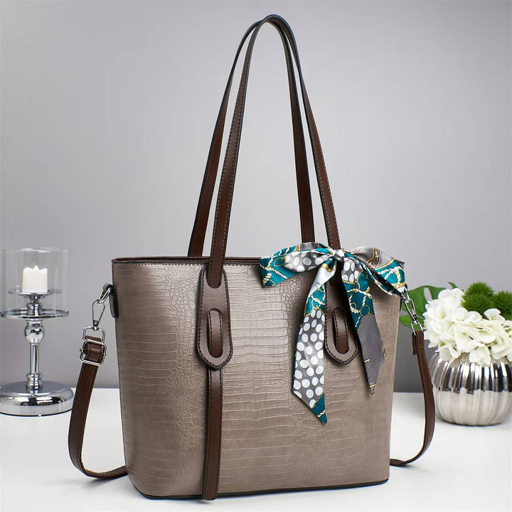 Damen elegante Handtasche mit modischen Schal-Akzenten Nord Taschen