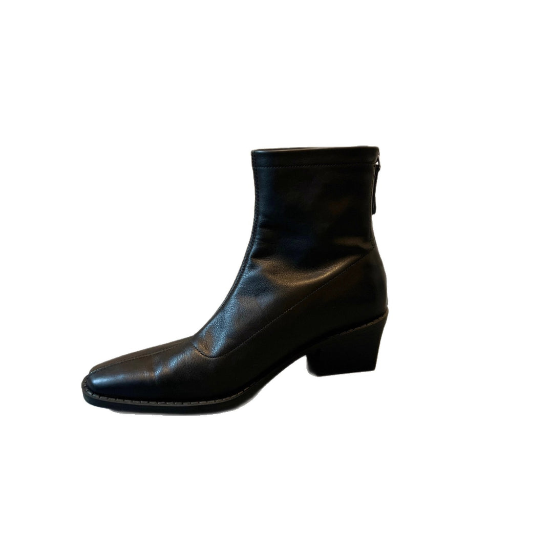 Damen Knöchelhohe Glattleder‑Stiefelette mit sculpted Keilabsatz Nord Taschen