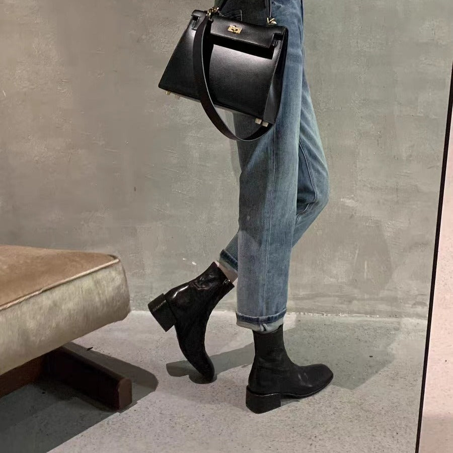 Damen Glattleder-Stiefelette mit schlanker Socken-Passform, innenliegendem Reißverschluss und sculpted Blockabsatz Nord Taschen