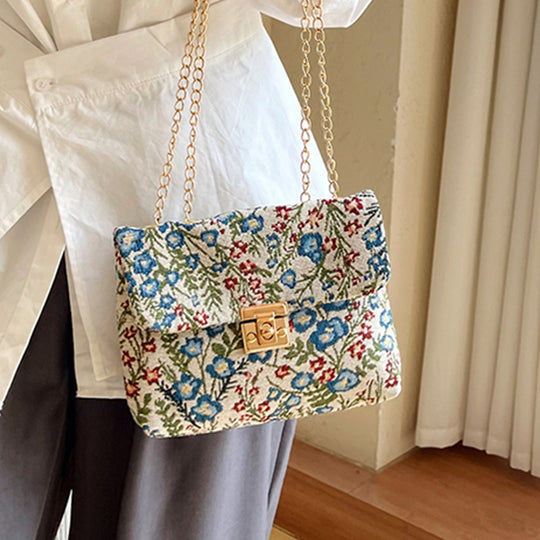 Damen Clutch-Tasche mit floralem Stoffdesign und goldener Kettenverzierung Nord Taschen