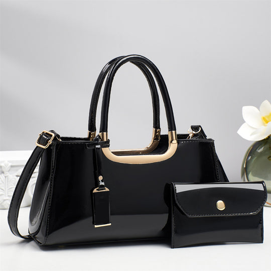 Damen Handtasche mit glänzender Oberfläche und elegantem Kettenakzent Nord Taschen