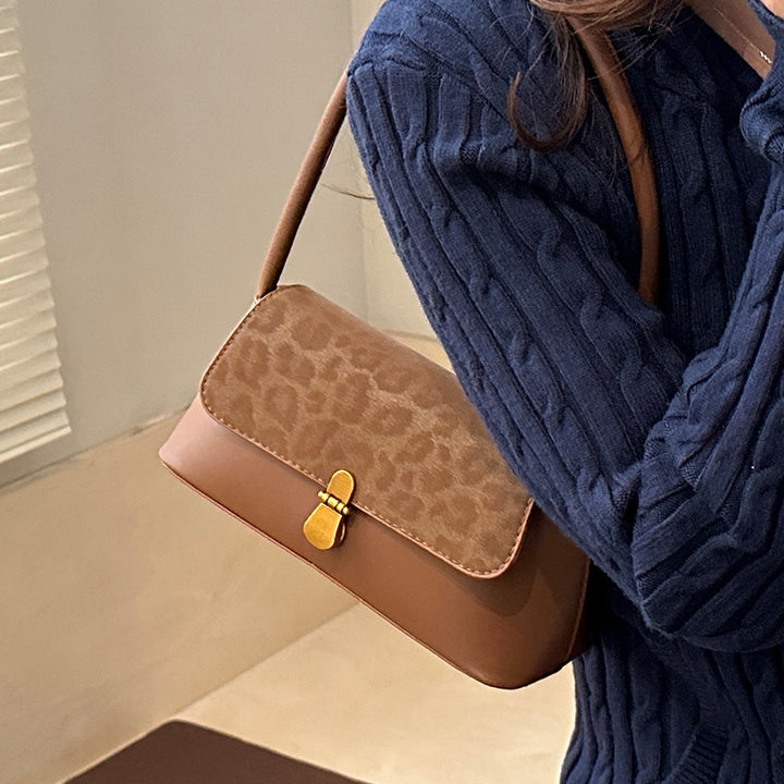 Damen Umhängetasche mit floralem Muster und elegantem Klappenverschluss Nord Taschen