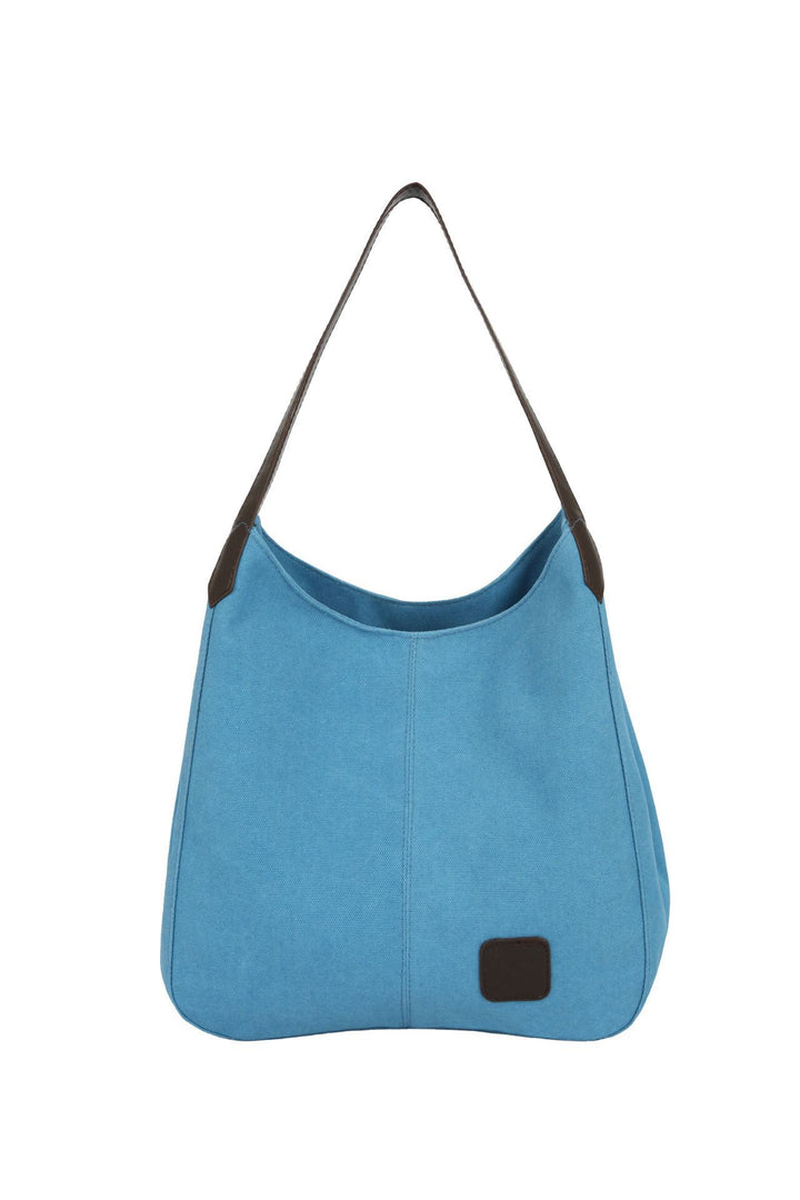 Damen Schultertasche aus strapazierfähigem Canvas mit eleganten Lederakzenten Nord Taschen