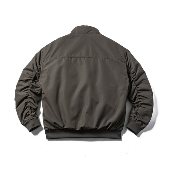 Herren Wattierte Bomberjacke im Boxy‑Cut mit hohem Stehkragen und geripptem Bund Nord Taschen