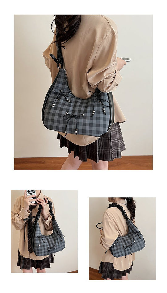Damen Hobo-Tasche mit dekorativem Kordelzug und glänzenden Akzenten Nord Taschen
