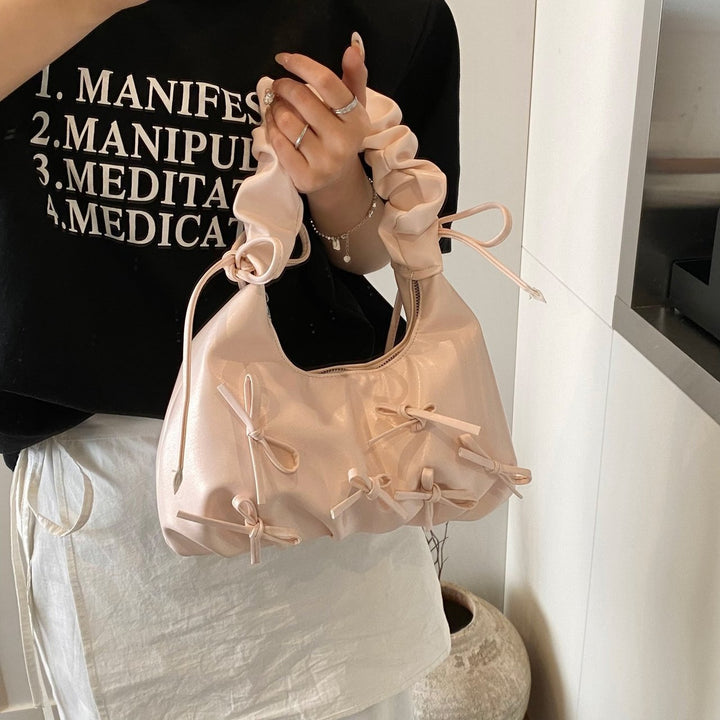 Damen Handtasche mit raffinierten Schleifen-Details und elegantem Tragegriff Nord Taschen