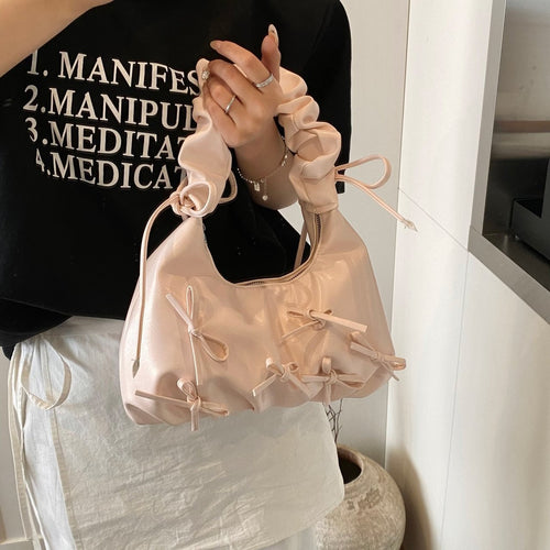 Damen Handtasche mit raffinierten Schleifen-Details und elegantem Tragegriff Nord Taschen