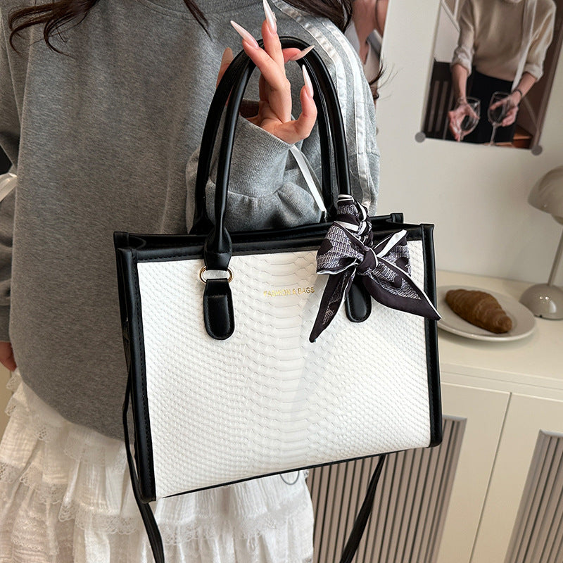 Damen stilvolle Handtasche mit geflochtenem Design und dekorativem Schleifenband Nord Taschen