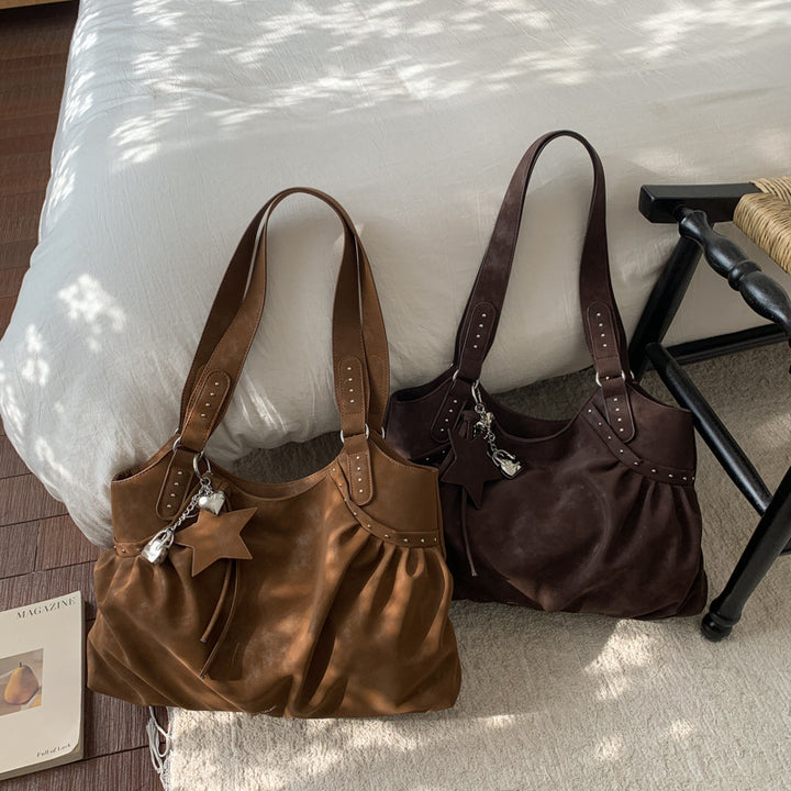 Damen Tasche mit raffiniertem Rüschendesign und Akzenten aus Metall von Nord Taschen
