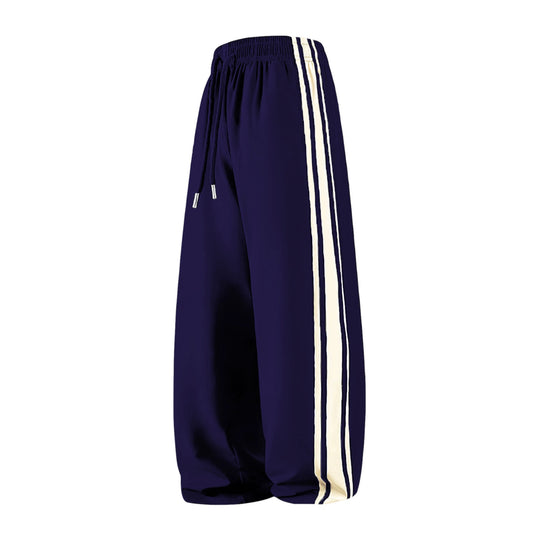 Damen Weite Trackpants mit Tunnelzugbund und seitlichen Kontraststreifen Nord Taschen