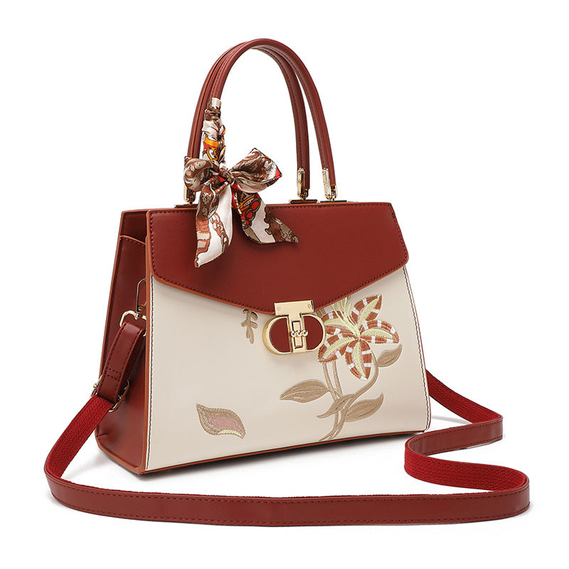 Damen Handtasche mit floraler Stickerei und dekorativem Schal Nord Taschen