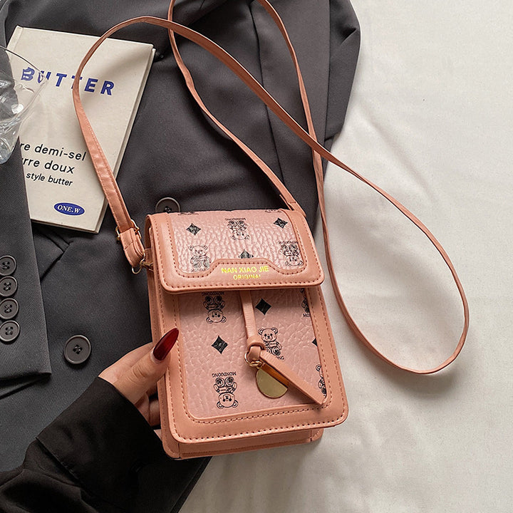 Damen Umhängetasche mit strukturiertem Design und dekorativen Details Nord Taschen