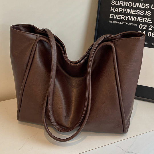 Damen elegante Schultertasche mit weichem Kunstleder und großzügigem Innenraum Nord Taschen