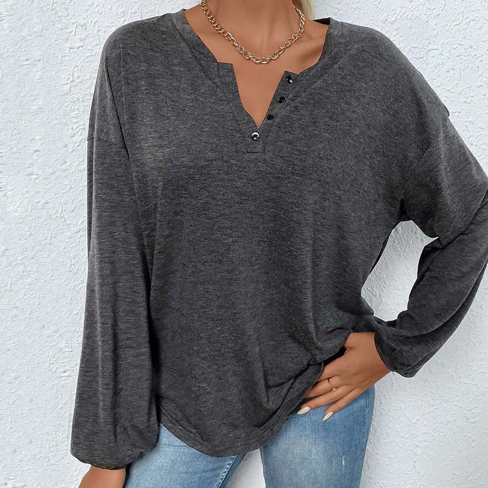 Damen lässiges Oversize-Henley-Longsleeve mit V-Knopfleiste und Ballonärmeln Nord Taschen